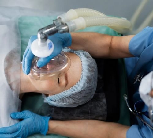 imgi 19 nurse putting oxygen mask patient 23 2149372301 2880w